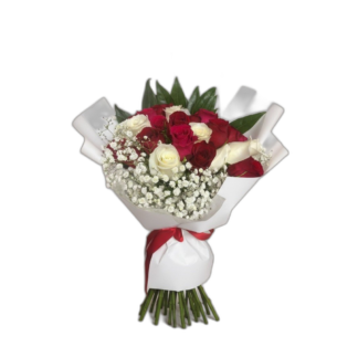 Red and white rose bouquet with carnations and greenery wrapped in white paper
