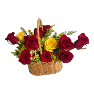 Red and yellow rose arrangement in a wicker handle basket