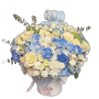 Blue and white carnation and rose arrangement with plush blue bear topper for new baby boy
